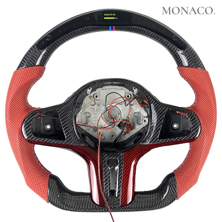 Custom carbon fiber steering wheel by Monaco