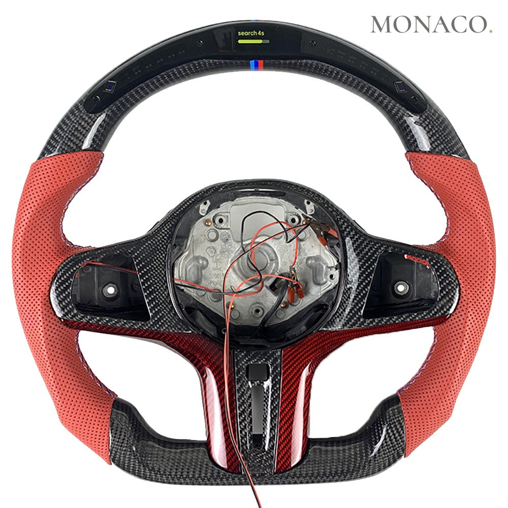 Custom carbon fiber steering wheel by Monaco