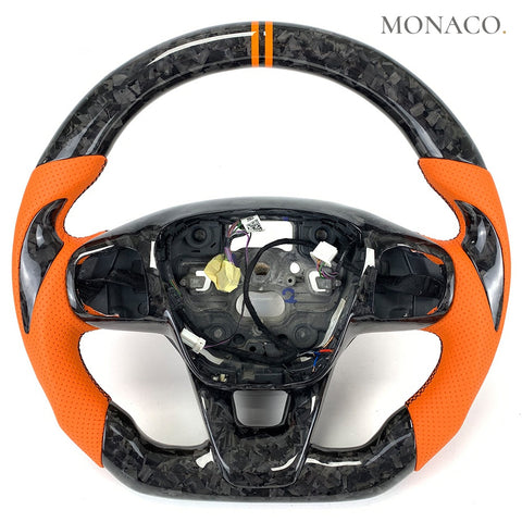 Custom carbon fiber steering wheel for Ford Focus Mk4 (2019–2022): Orange Perforated Leather Forged Carbon