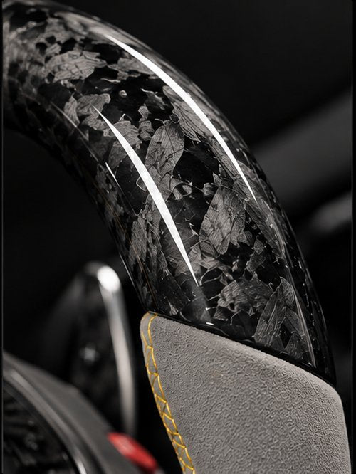 Forged carbon fiber marbled finish on the wheel
