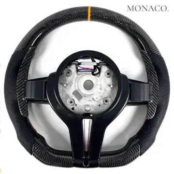 Factory OEM trim on the steering wheel